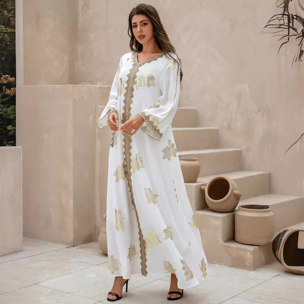 A golden-flowered Abaya robe